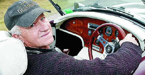 LABOUR OF LOVE: Ken McKenzie behind the wheel of his beloved Cobra replica. LABOUR OF LOVE: Ken McKenzie behind the wheel of his beloved Cobra replica.